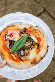 Sourdough pizzas with aubergine, and harissa